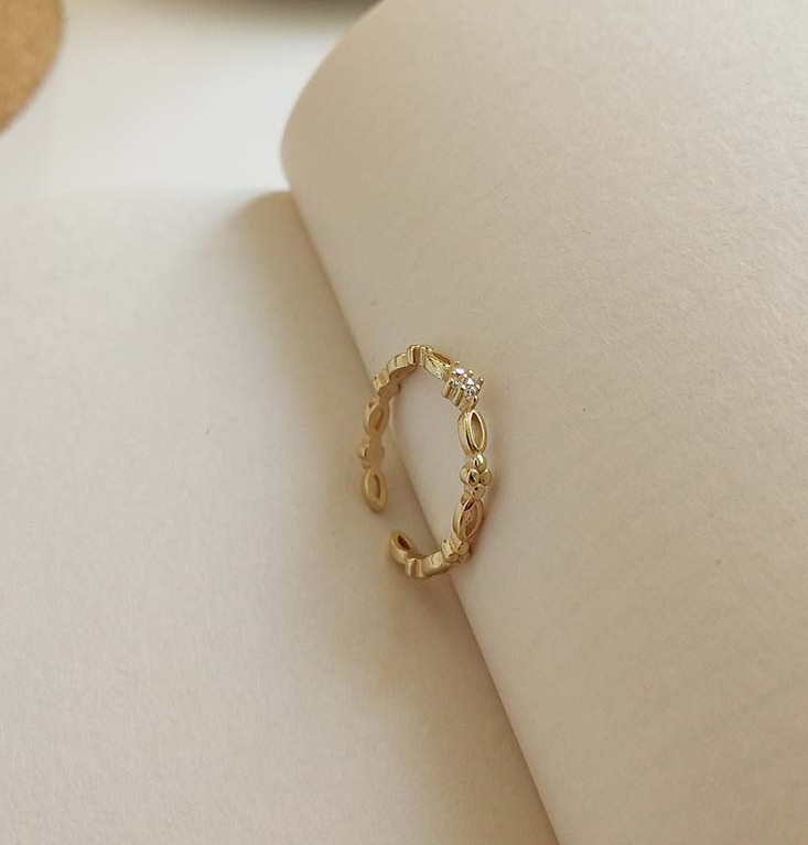 Side view of the Golden Open Ring showing its adjustable open band