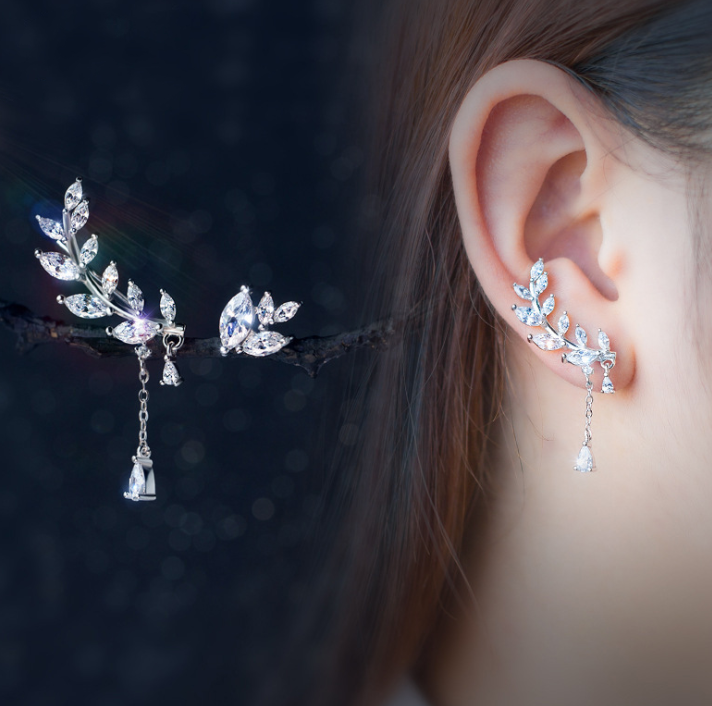 Leaf Climber Earrings worn on an ear, showing the climber and its fine drop chain