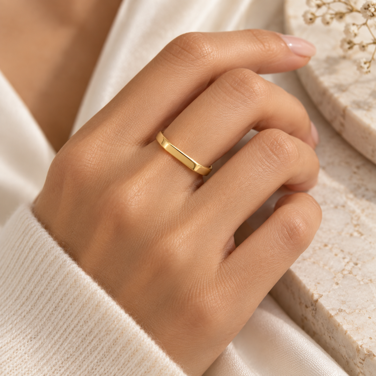 Glow Signet Ring worn on the ring finger