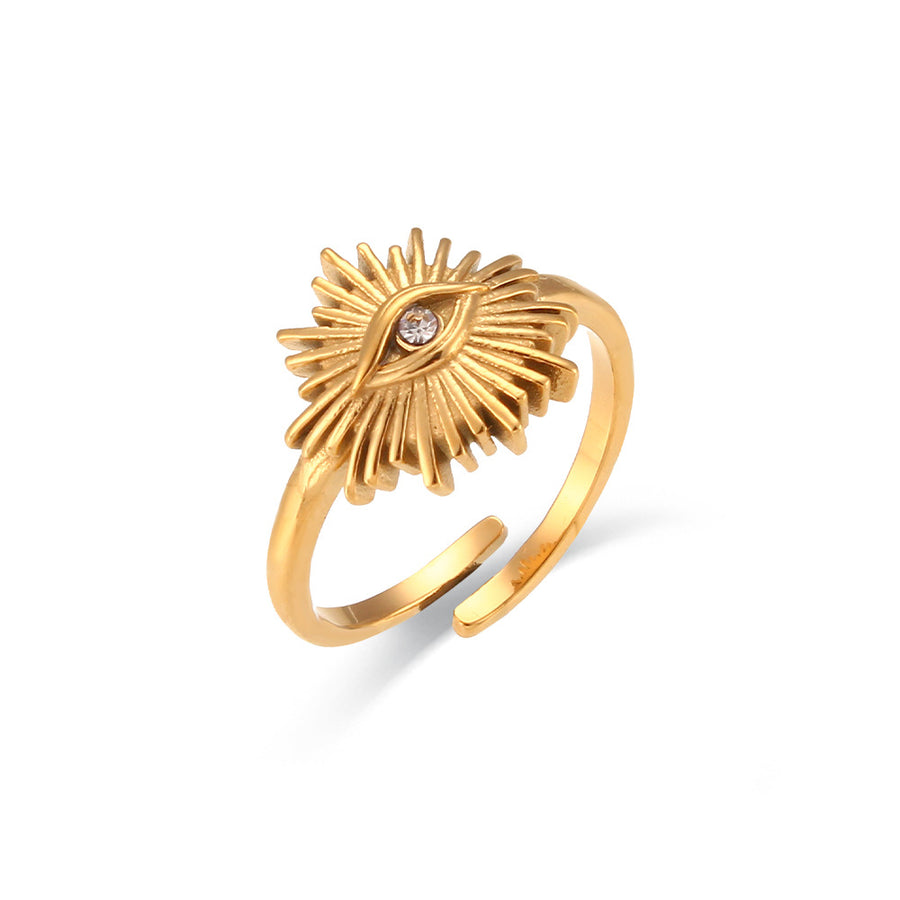 Solana Sun Ring, a gold-plated sunburst ring with an eye motif and a small zircon, on a white background